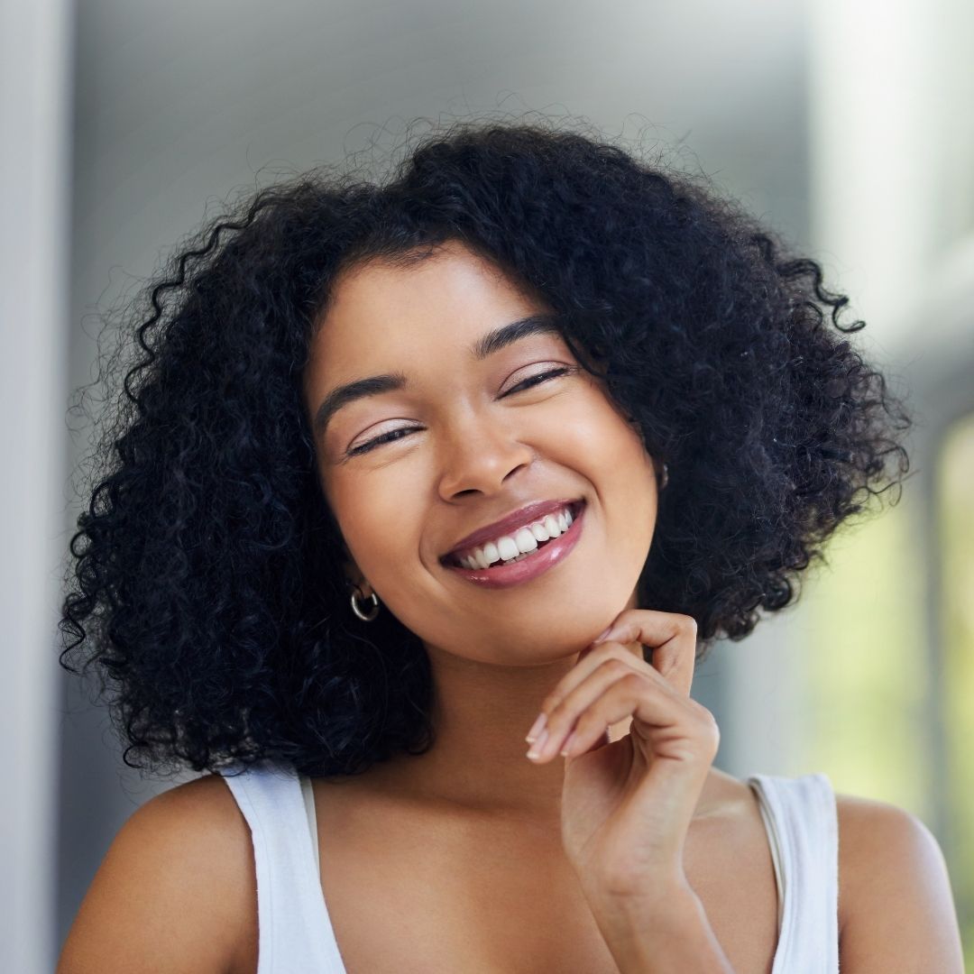 Woman smiling in mirror