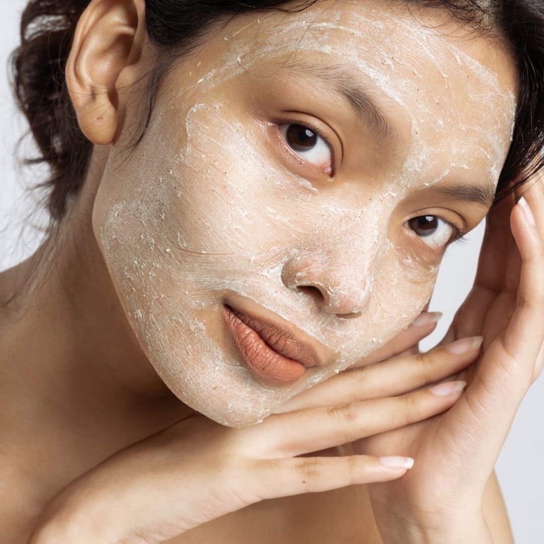 someone with a facial scrub on