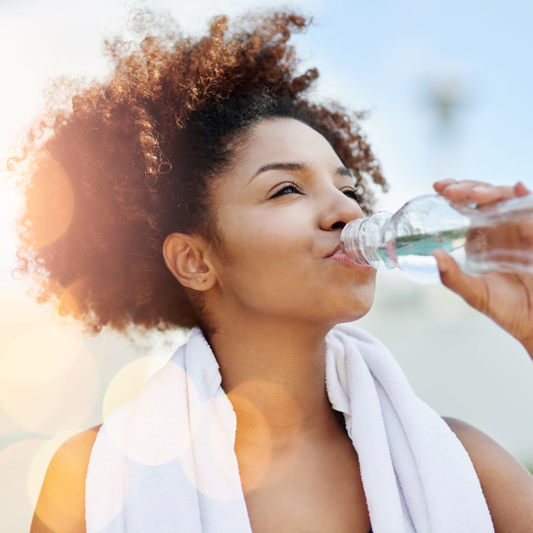 a woman drinking water