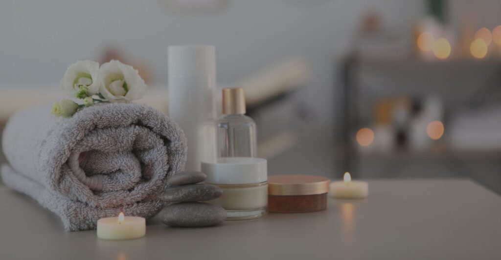 a spa towel and various spa products