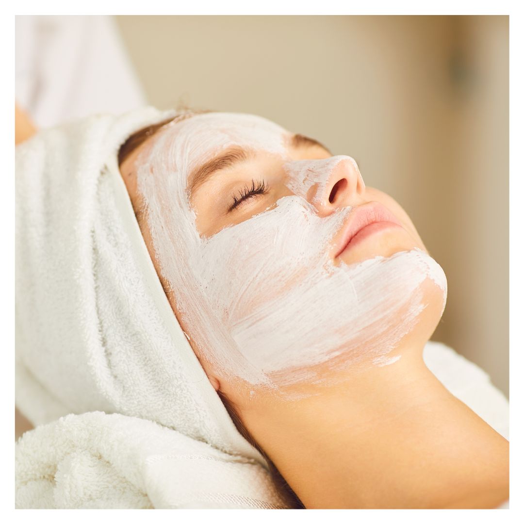 a woman relaxing with a facial