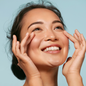 A woman smiling with healthy skin